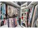 Well-organized walk-in closet with rods, shelves, and drawers for efficient storage at 204 Latitude Pl, Apollo Beach, FL 33572