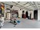Organized garage space with epoxy floors and plenty of storage solutions at 204 Latitude Pl, Apollo Beach, FL 33572