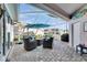 Inviting screened patio with ample seating, decorative accents, and views of the backyard at 204 Latitude Pl, Apollo Beach, FL 33572