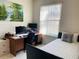 Bright office/bedroom with natural light and a desk by a bright window at 4209 Amber Ridge Ln, Valrico, FL 33594
