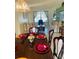 Open floor plan with dining room leading into the living room and plenty of natural light at 4209 Amber Ridge Ln, Valrico, FL 33594