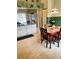 Bright eat-in kitchen with granite countertops and tile flooring, adjacent to dining area at 4209 Amber Ridge Ln, Valrico, FL 33594