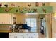 Well-maintained kitchen open to living area, featuring granite counters and modern appliances at 4209 Amber Ridge Ln, Valrico, FL 33594