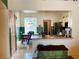 Bright kitchen and dining area with granite counters, stainless appliances, and natural light at 4209 Amber Ridge Ln, Valrico, FL 33594