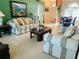 Inviting living room with comfortable seating, tile floors, and decor at 4209 Amber Ridge Ln, Valrico, FL 33594