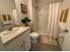 Bright bathroom with a walk-in shower, vanity, and modern fixtures at 16949 Secret Meadow Dr, Odessa, FL 33556