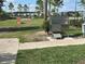 Community dog park featuring a dog wash station and play structures set in a green space at 16949 Secret Meadow Dr, Odessa, FL 33556