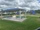 A community playground with a covered picnic area and ample green space at 16949 Secret Meadow Dr, Odessa, FL 33556