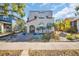 Charming home featuring a stucco exterior, arched windows, and a well-manicured front yard with tropical landscaping at 2528 3Rd N Ave, St Petersburg, FL 33713