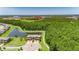 Aerial view of an elegant townhome with pond views and walking trail near SR 54 at 4899 Isola Ct, Wesley Chapel, FL 33543