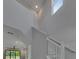 Bright, open staircase area with a modern aesthetic and abundant natural light at 4899 Isola Ct, Wesley Chapel, FL 33543