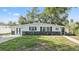 Charming single-story home with well-maintained lawn and classic curb appeal at 8703 Driftwood Dr, Tampa, FL 33615