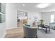 Open-concept living space showcasing the modern kitchen and seamlessly connected living area at 8703 Driftwood Dr, Tampa, FL 33615