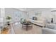 Inviting living room with comfortable seating, neutral decor, and a bright ambiance at 8703 Driftwood Dr, Tampa, FL 33615