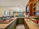 Finished basement featuring wet bar with seating, and a pool table for endless entertaining possibilities at 12700 Grand Traverse Dr, Dade City, FL 33525