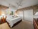 Charming bedroom with a nautical theme, featuring a cozy bed, lamps, and a large closet for storage at 12700 Grand Traverse Dr, Dade City, FL 33525