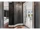 Luxurious bathroom featuring a standalone tub with balcony and view at 4902 Carranza Ct, Tampa, FL 33616