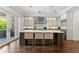 Spacious kitchen featuring a large center island, stainless steel appliances, and custom cabinetry at 4902 Carranza Ct, Tampa, FL 33616