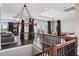 Spacious living room with large windows and stylish contemporary furniture at 4902 Carranza Ct, Tampa, FL 33616
