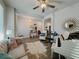 Bright living room features hardwood floors, neutral walls, and an abundance of natural light at 5709 Camila Song Ln, Tampa, FL 33625