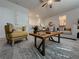 Cozy living room features a comfortable seating area, stylish coffee table, and neutral decor at 5709 Camila Song Ln, Tampa, FL 33625