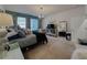 Relaxing main bedroom with a comfortable bed, stylish furnishings, and ample closet space at 5709 Camila Song Ln, Tampa, FL 33625