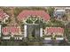 Aerial view showcasing waterfront condos with manicured grounds and convenient parking at 7520 Sunshine Skyway S Ln # T18, St Petersburg, FL 33711