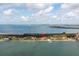 Aerial view showcasing waterfront condos and community pool at 7520 Sunshine Skyway S Ln # T18, St Petersburg, FL 33711
