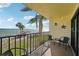 Balcony with seating overlooking bay at 7520 Sunshine Skyway S Ln # T18, St Petersburg, FL 33711