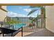 Balcony view of a pool and bay at 7520 Sunshine Skyway S Ln # T18, St Petersburg, FL 33711