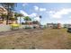 Image showing kayaks and canoes available for residents, surrounded by palm trees and lush grass at 7520 Sunshine Skyway S Ln # T18, St Petersburg, FL 33711