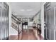 Bright and airy living room featuring hardwood floors and an open concept design at 10409 Waterstone Dr, Riverview, FL 33578