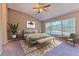 Cozy bedroom featuring a large window with water views, and neutral accents at 18827 Duquesne Dr, Tampa, FL 33647
