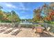 Beautiful lake view from the community pool area, perfect for relaxing and enjoying the scenery at 18827 Duquesne Dr, Tampa, FL 33647