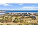 Stunning aerial view of the waterfront community, golf course, and bay at 2617 Cove Cay Dr # 604, Clearwater, FL 33760