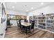 Modern conference room with sleek furniture and a full wall bookcase at 2617 Cove Cay Dr # 604, Clearwater, FL 33760