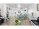 Inviting dining area open to the living room with plenty of natural light at 2617 Cove Cay Dr # 604, Clearwater, FL 33760
