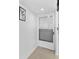 Bright entryway features white walls, neutral tile flooring, and a modern door design at 2617 Cove Cay Dr # 604, Clearwater, FL 33760