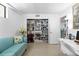 Inviting living area featuring a built-in bookcase and an open doorway at 2617 Cove Cay Dr # 604, Clearwater, FL 33760