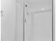 All-white tiled shower with glass door at 2617 Cove Cay Dr # 604, Clearwater, FL 33760