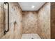 Beautiful tile shower with dual showerheads and convenient grab bar at 2617 Cove Cay Dr # 604, Clearwater, FL 33760