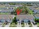 A bird's eye view of townhomes featuring attached garages, landscaping, and proximity to neighborhood amenities at 3818 Cat Mint St, Tampa, FL 33619