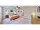 Serene main bedroom with ceiling fan, offering relaxation at 3818 Cat Mint St, Tampa, FL 33619