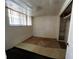 Modest bedroom with a closet, window, and carpeted floors needs updating at 8302 N Lois Ave, Tampa, FL 33614