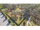 Aerial view of fenced dog park near the community's park with sidewalks and street parking at 12312 Bay Estuary Bnd, Riverview, FL 33579