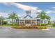 Beautiful clubhouse with palm trees in the community provides resort-style living for the homeowners at 12312 Bay Estuary Bnd, Riverview, FL 33579