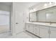Bathroom featuring marble floors and a double vanity at 3218 21St N St, St Petersburg, FL 33713