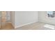 Bedroom with white walls, laminate floors and a bright window overlooking the neighborhood at 3218 21St N St, St Petersburg, FL 33713