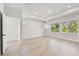 Bright bedroom with multiple windows and wood-look floors at 3218 21St N St, St Petersburg, FL 33713