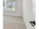 Bright bedroom featuring neutral carpet, white walls, and a large window offering ample natural light at 3218 21St N St, St Petersburg, FL 33713